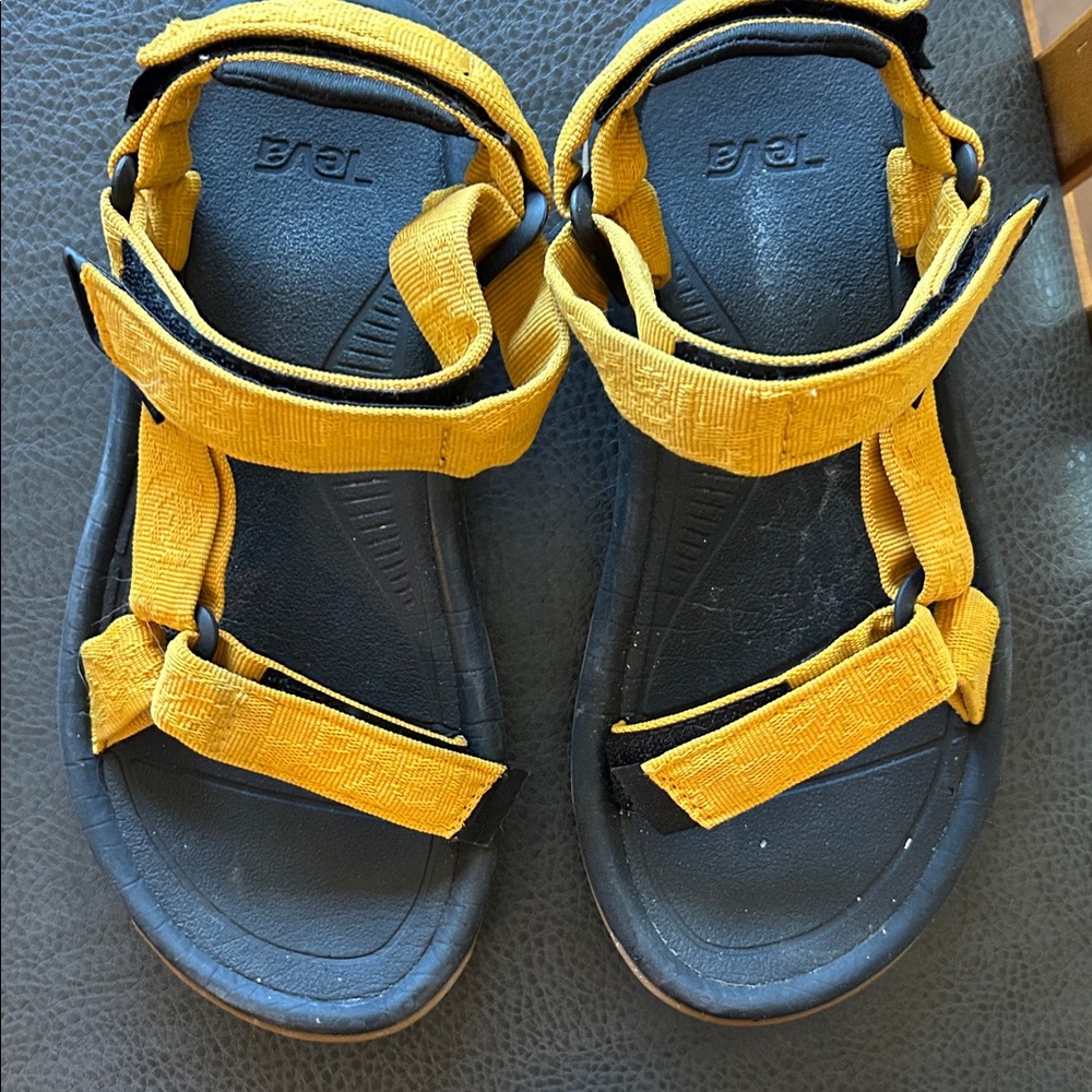 Teva women’s Black and Yellow Sandals